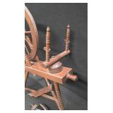 Antique wooden spinning wheel