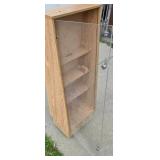 Melamine display cabinet with clear plastic door, locks, 2 keys and 4 wheels