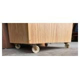 Melamine display cabinet with clear plastic door, locks, 2 keys and 4 wheels