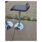 Bar height table and 2 matching rotating bar stools