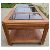 Glass-top coffee table