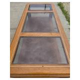 Glass-top coffee table