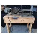 POWER HACK SAW ON HEAVY DUTY WOOD BENCH POWER HACK SAW ON HEAVY DUTY WOOD BENCH