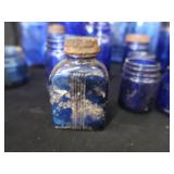 18 COBALT BLUE GLASS BOTTLES 18 COBALT BLUE GLASS BOTTLES