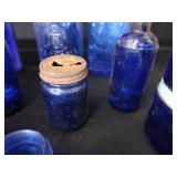 18 COBALT BLUE GLASS BOTTLES 18 COBALT BLUE GLASS BOTTLES