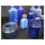 18 COBALT BLUE GLASS BOTTLES 18 COBALT BLUE GLASS BOTTLES