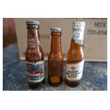 3 MINI BEER BOTTLES AND A BOX OF ASSORTED ANTIQUE / VINTAGE BOTTLES 3 MINI BEER BOTTLES AND A BOX OF ASSORTED ANTIQUE / VINTAGE BOTTLES