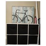 6-Cube White Storage Organizer with Black Fabric Bins and Bicycle Wall Art