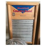 Vintage Laundry Collection with Washboards, Glass Jar of Clothespins, Iron, and Laundry Soda