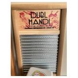 Vintage Laundry Collection with Washboards, Glass Jar of Clothespins, Iron, and Laundry Soda