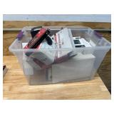Bin of random item and electronic related items Bin of random item and electronic related items