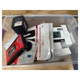 Bin of random item and electronic related items Bin of random item and electronic related items
