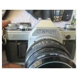 Canon AE-1 35mm Camera with Accessories, Case, Tripod and Nikon Binoculars