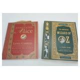 "The Annotated Alice" by Lewis Carroll & "The Annotated Wizard of Oz" by L. Frank Baum