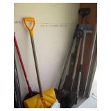 Lot of shovels and yard tools...