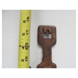 Antique Cast Iron General Store J-Shaped Rack Stand