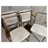 Four Vintage Folding Chairs Four Vintage Folding Chairs