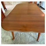 Dining Room Table with Three Leaves and Protective Covers Dining Room Table with Three Leaves and Protective Covers