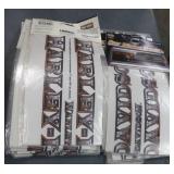 Box of 50 Harley Davidson decals and 20 Redneck decals