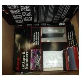 Box of various decals and stickers