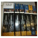 group of dvds, cds, vhs