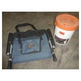 stadium seat with a backrest and a plano bait bucket