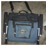 stadium seat with a backrest and a plano bait bucket