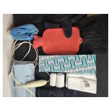 Collection of Medical Supports, Braces, Hot Water Bottle, and Supplies