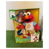 Check-Up Time Elmo & T.M.X. Tickle Me Elmo Check-Up Time Elmo & T.M.X. Tickle Me Elmo