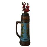 Vintage Beer Stein German Origin Featuring a Figurine Design of Man and Woman with Traditional Attire