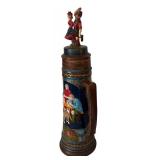 Vintage Beer Stein German Origin Featuring a Figurine Design of Man and Woman with Traditional Attire