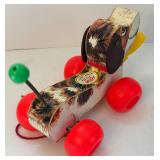 Vintage Wind-Up Toys Including Fisher-Price Little Snoopy Model #693, Schylling Collector Series Dog & Ball Tim Toy and Puppy Dog Musical Hack-in-the Box by Schylling