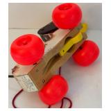 Vintage Wind-Up Toys Including Fisher-Price Little Snoopy Model #693, Schylling Collector Series Dog & Ball Tim Toy and Puppy Dog Musical Hack-in-the Box by Schylling