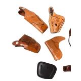 Collection of 15 Mixed Leather and Synthetic Gun Holsters