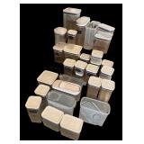 Collection of Clear Plastic Airtight Food Storage Containers with Lids