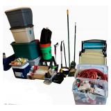 Garage and Outdoor Equipment Lot with Tools, Extension Cords, Folding Chairs, and Storage Bins