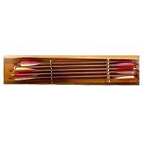 Box of Fletched Wooden Arrows with Red and White Vanes