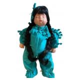 Vintage Doll with Long Black Braided Hair and Turquoise Outfit