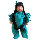 Vintage Doll with Long Black Braided Hair and Turquoise Outfit