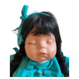 Vintage Doll with Long Black Braided Hair and Turquoise Outfit