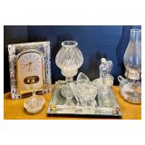 Collection of Glass Tabletop Decor Including Seiko Clock and Oil Lamp