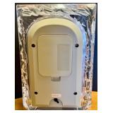 Collection of Glass Tabletop Decor Including Seiko Clock and Oil Lamp