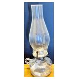 Collection of Glass Tabletop Decor Including Seiko Clock and Oil Lamp