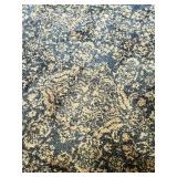 Large Round Patterned Area Rug with Blue and Tan Design