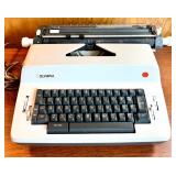 Olympia Electric Typewriter and Ibico 1232 Printing Calculator Set