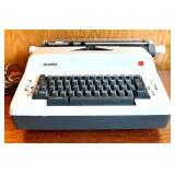 Olympia Electric Typewriter and Ibico 1232 Printing Calculator Set