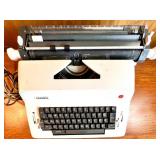 Olympia Electric Typewriter and Ibico 1232 Printing Calculator Set