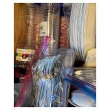 Collection of Disposable Tableware including Plates, Cups, Utensils, and Napkins