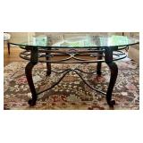 Oval Glass Top Coffee Table with Metal Scrollwork Base