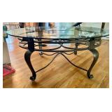 Oval Glass Top Coffee Table with Metal Scrollwork Base